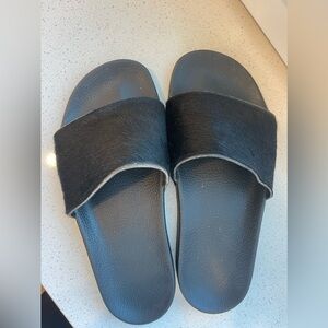 Black adidas slides